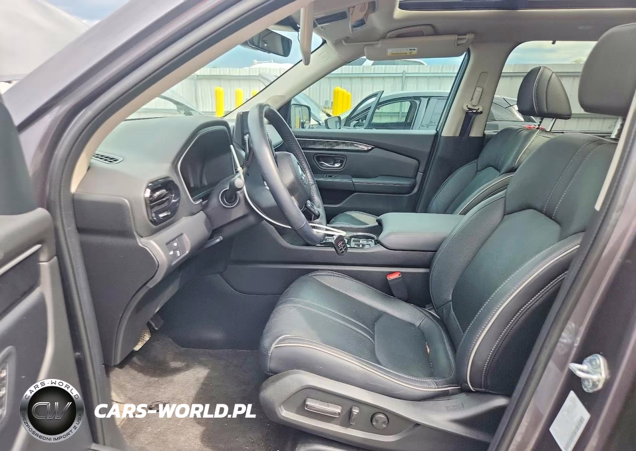 2023 Honda Pilot Elite VIN:5FNYG1H88PB038103 - 7