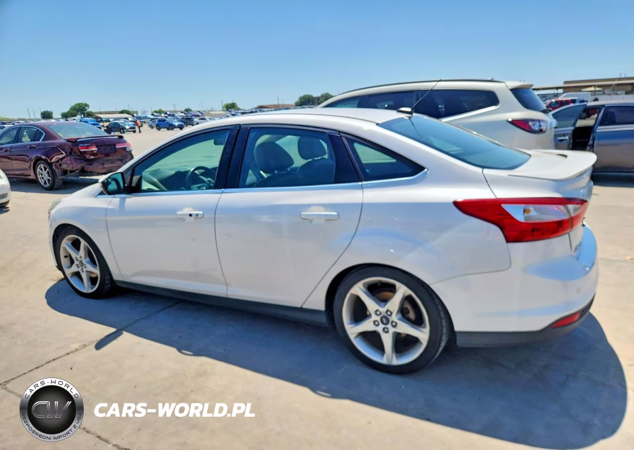 2014 Ford Focus Titanium VIN:1FADP3J27EL132733 - 2