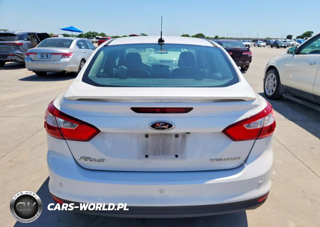 2014 Ford Focus Titanium VIN:1FADP3J27EL132733 - 6