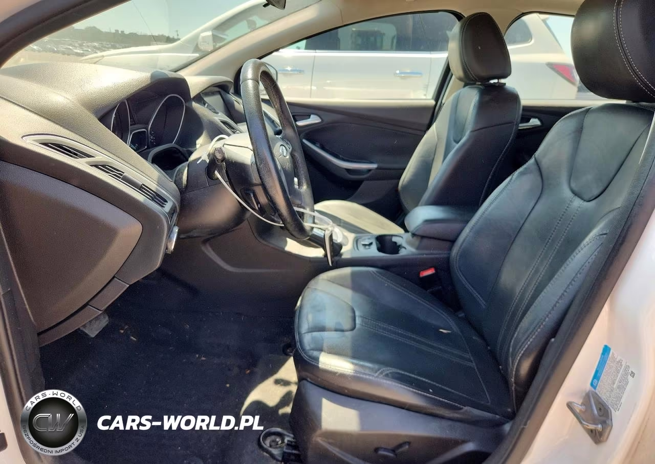2014 Ford Focus Titanium VIN:1FADP3J27EL132733 - 7