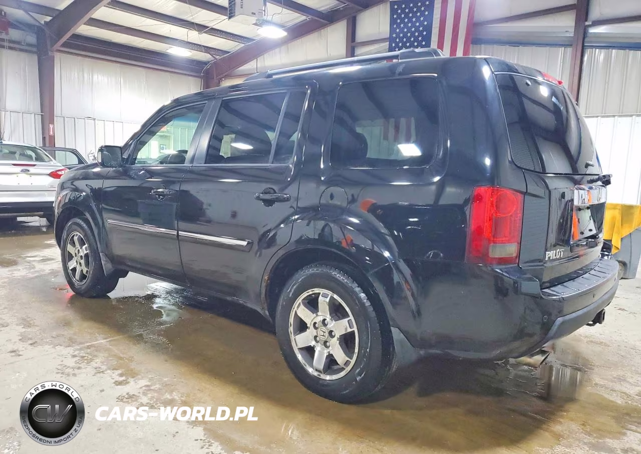 2011 Honda Pilot Touring VIN:5FNYF4H95BB003217 - 2