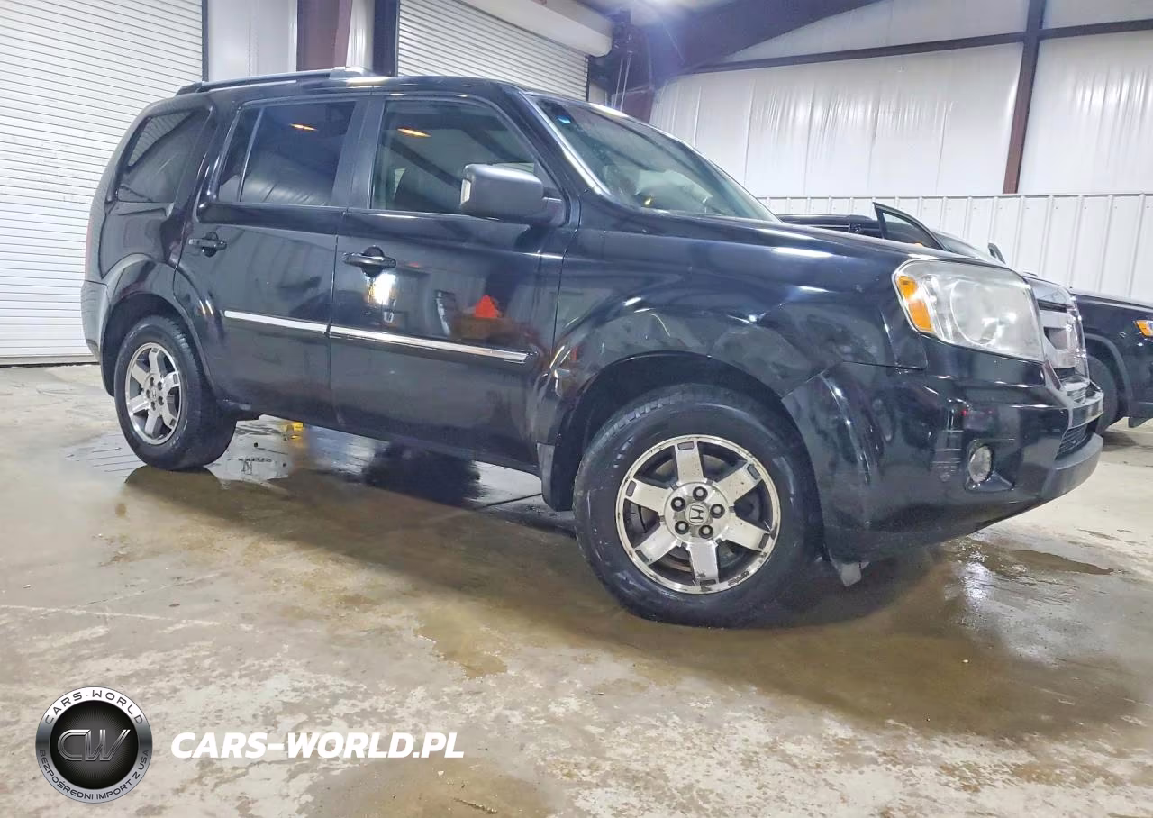 2011 Honda Pilot Touring VIN:5FNYF4H95BB003217 - 4