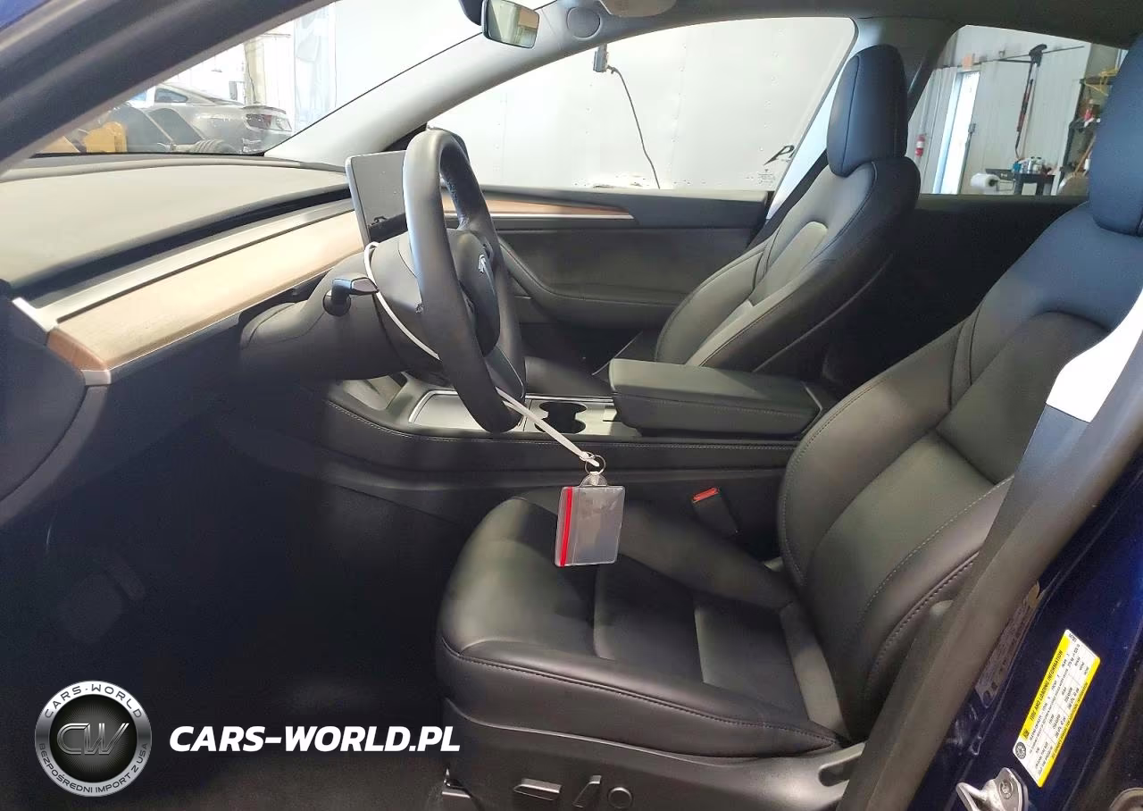 2023 Tesla Model Y VIN:7SAYGDEE8PF847003 - 7