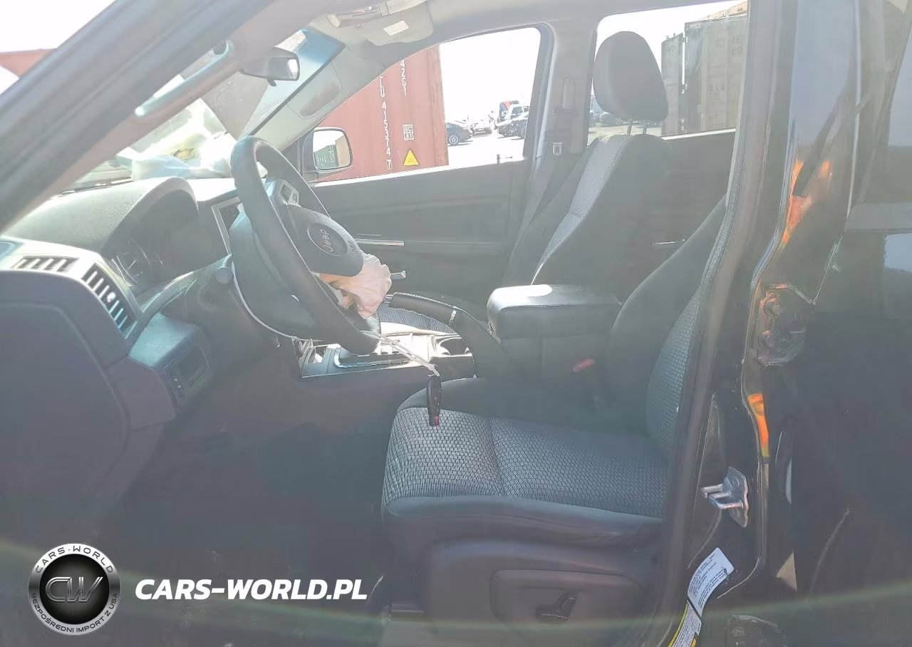 2009 Jeep Grand Cherokee Laredo VIN:1J8GR48K29C553383 - 7