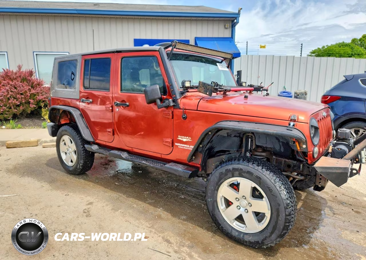 2009 Jeep Wrangler Unlimited Sahara VIN:1J4GA59149L746039 - 4