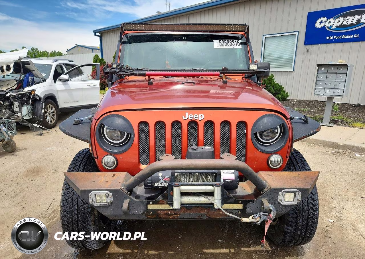 2009 Jeep Wrangler Unlimited Sahara VIN:1J4GA59149L746039 - 5