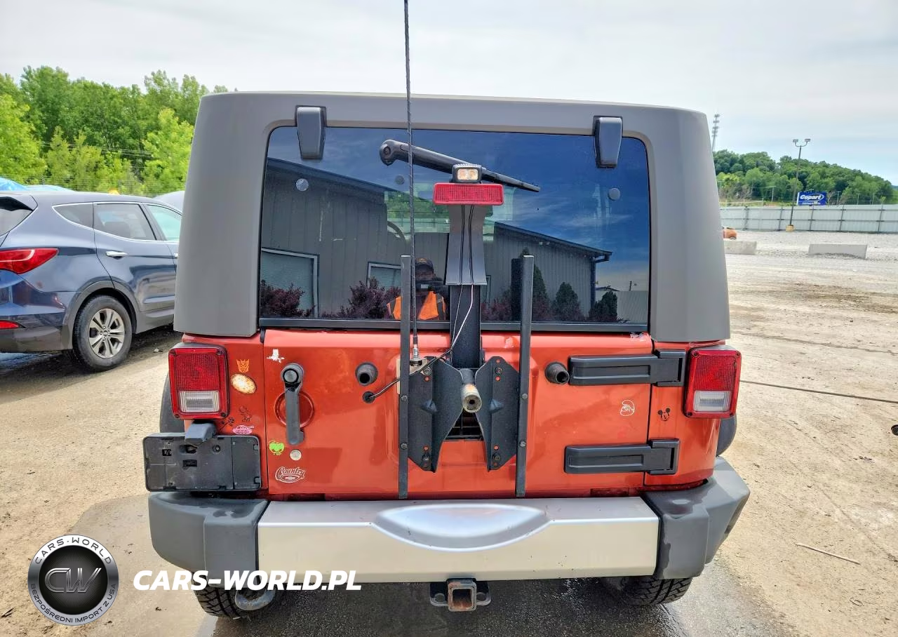 2009 Jeep Wrangler Unlimited Sahara VIN:1J4GA59149L746039 - 6