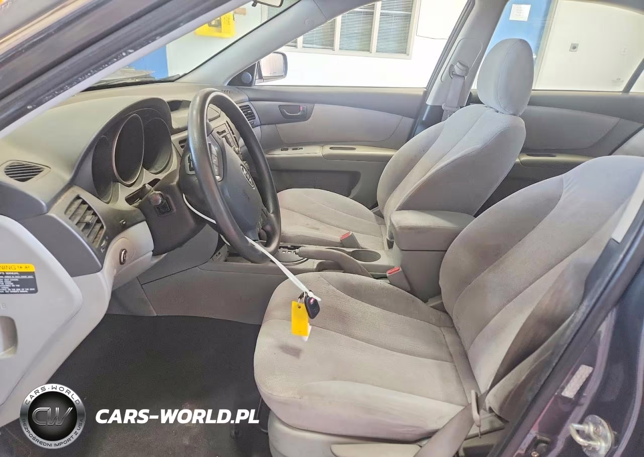 2009 Kia Optima Lx VIN:KNAGE228795308424 - 7