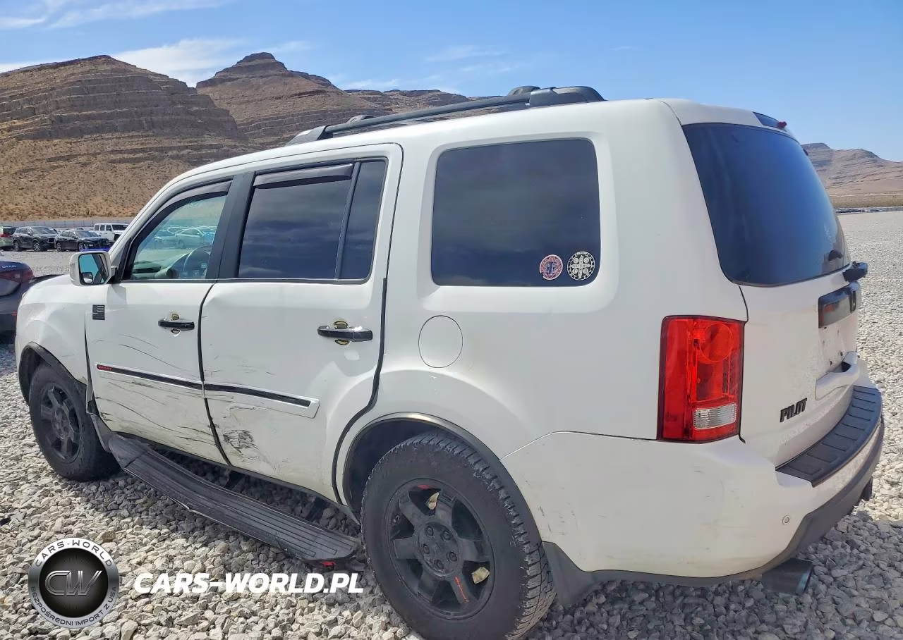 2010 Honda Pilot Touring VIN:5FNYF4H97AB030692 - 2