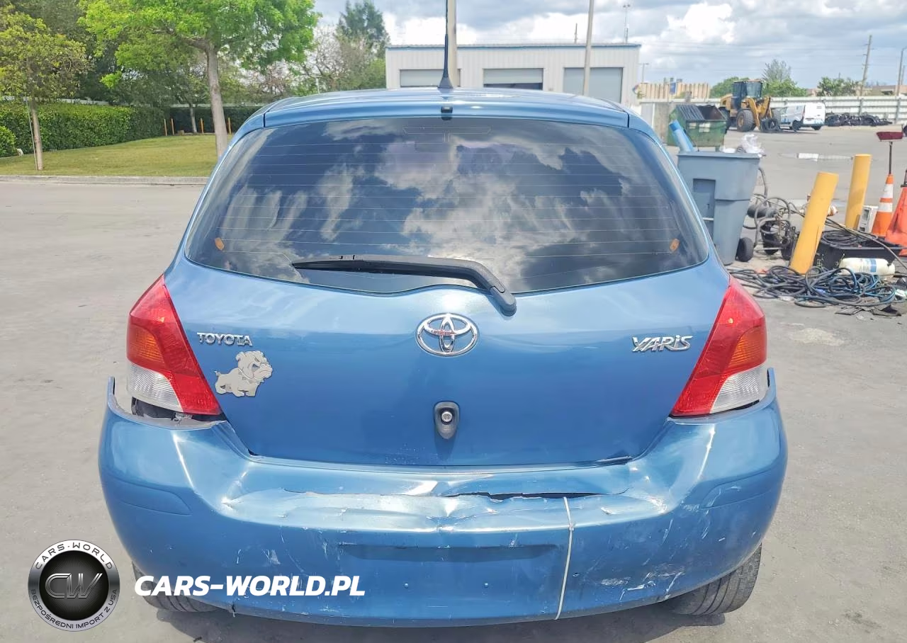 2009 Toyota Yaris Base VIN:JTDKT903495252509 - 6