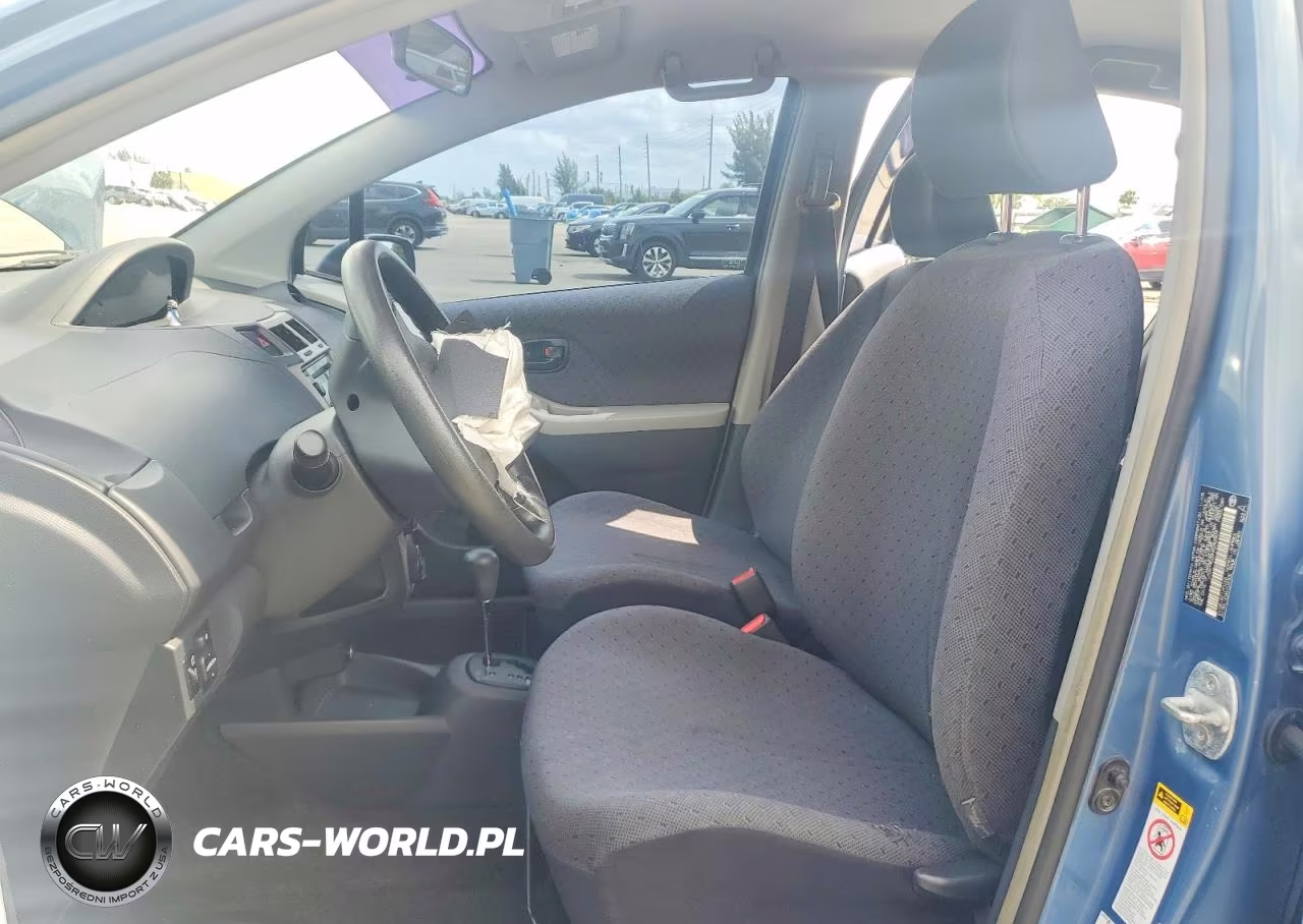 2009 Toyota Yaris Base VIN:JTDKT903495252509 - 7