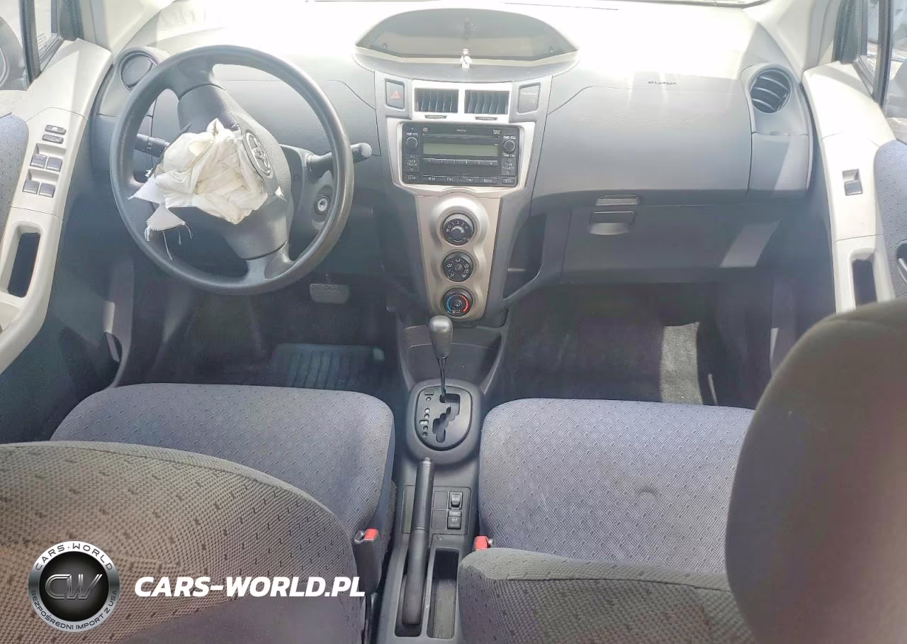 2009 Toyota Yaris Base VIN:JTDKT903495252509 - 8