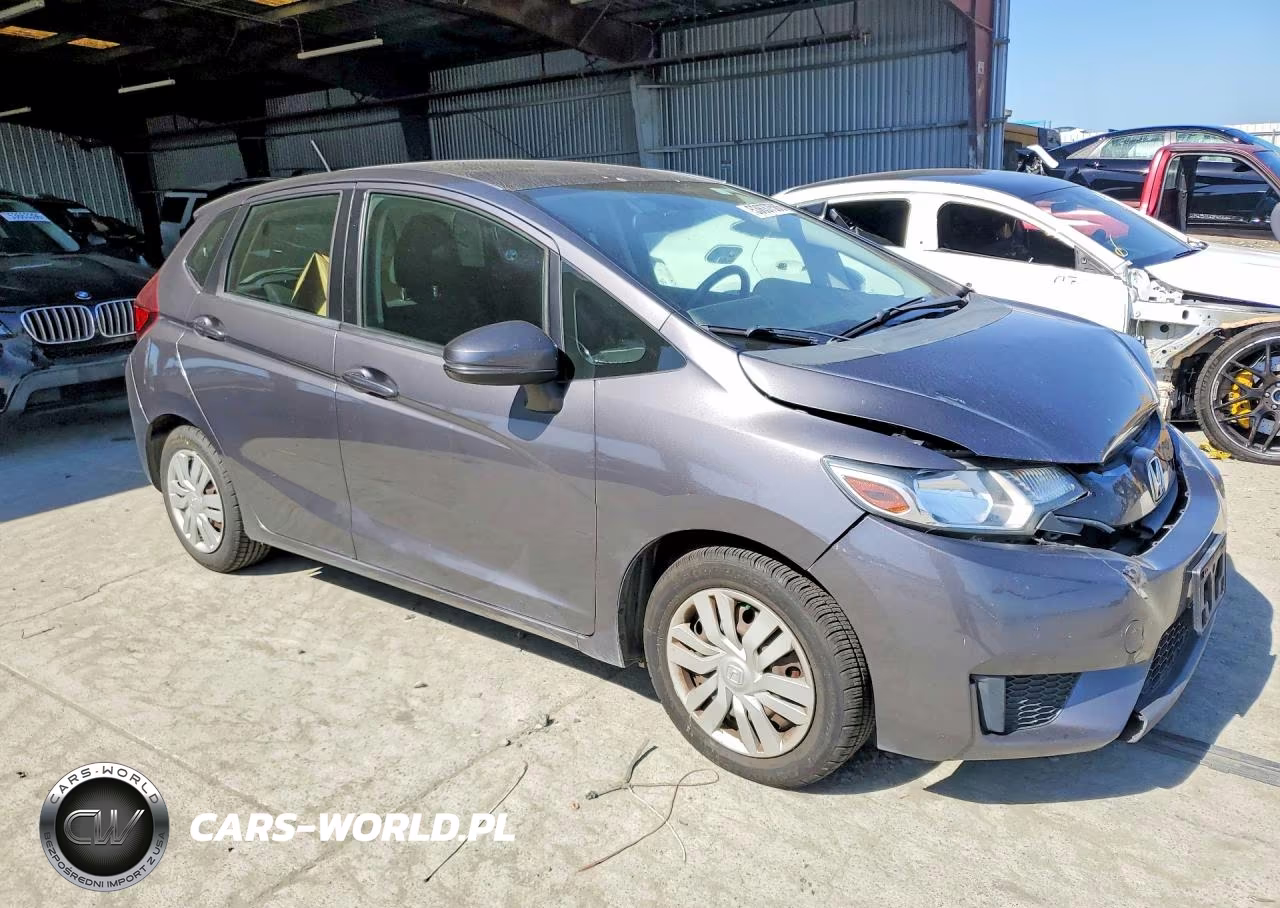 2015 Honda Fit Lx VIN:3HGGK5H56FM744327 - 4