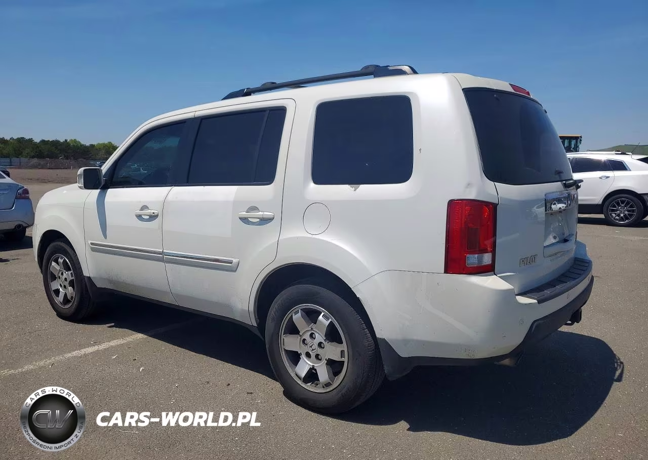 2011 Honda Pilot Touring VIN:5FNYF4H95BB026299 - 2