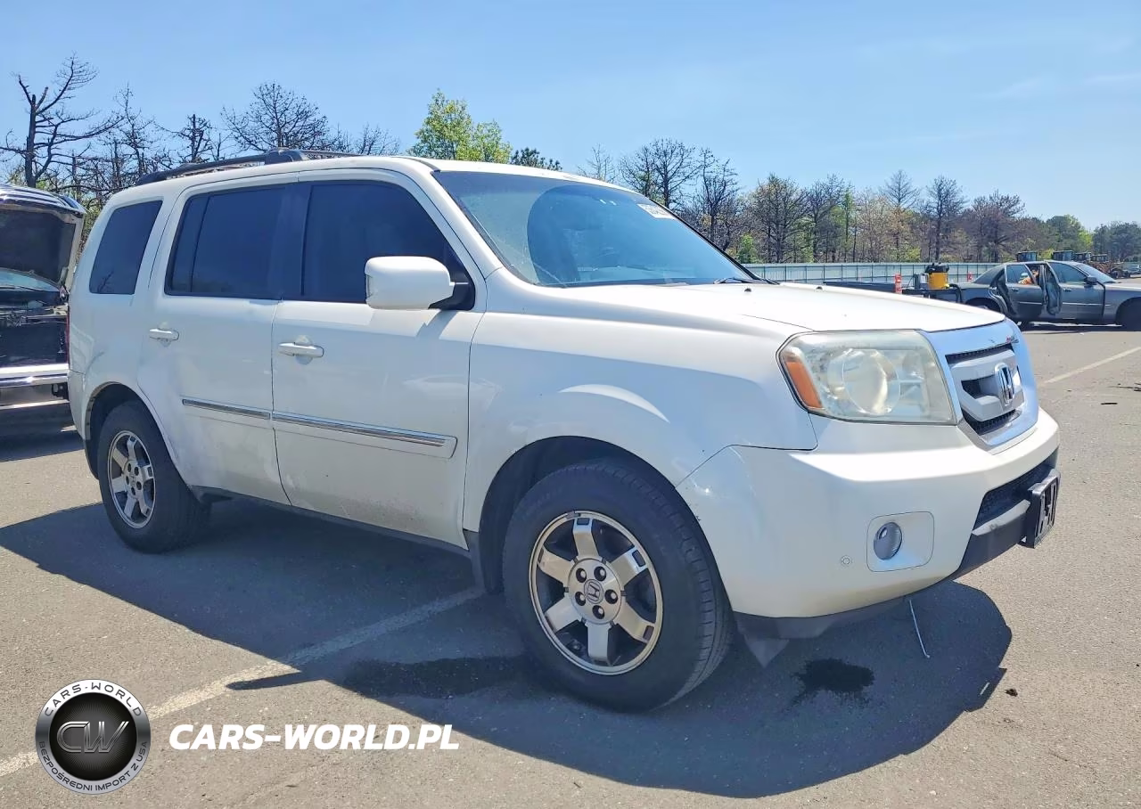 2011 Honda Pilot Touring VIN:5FNYF4H95BB026299 - 4