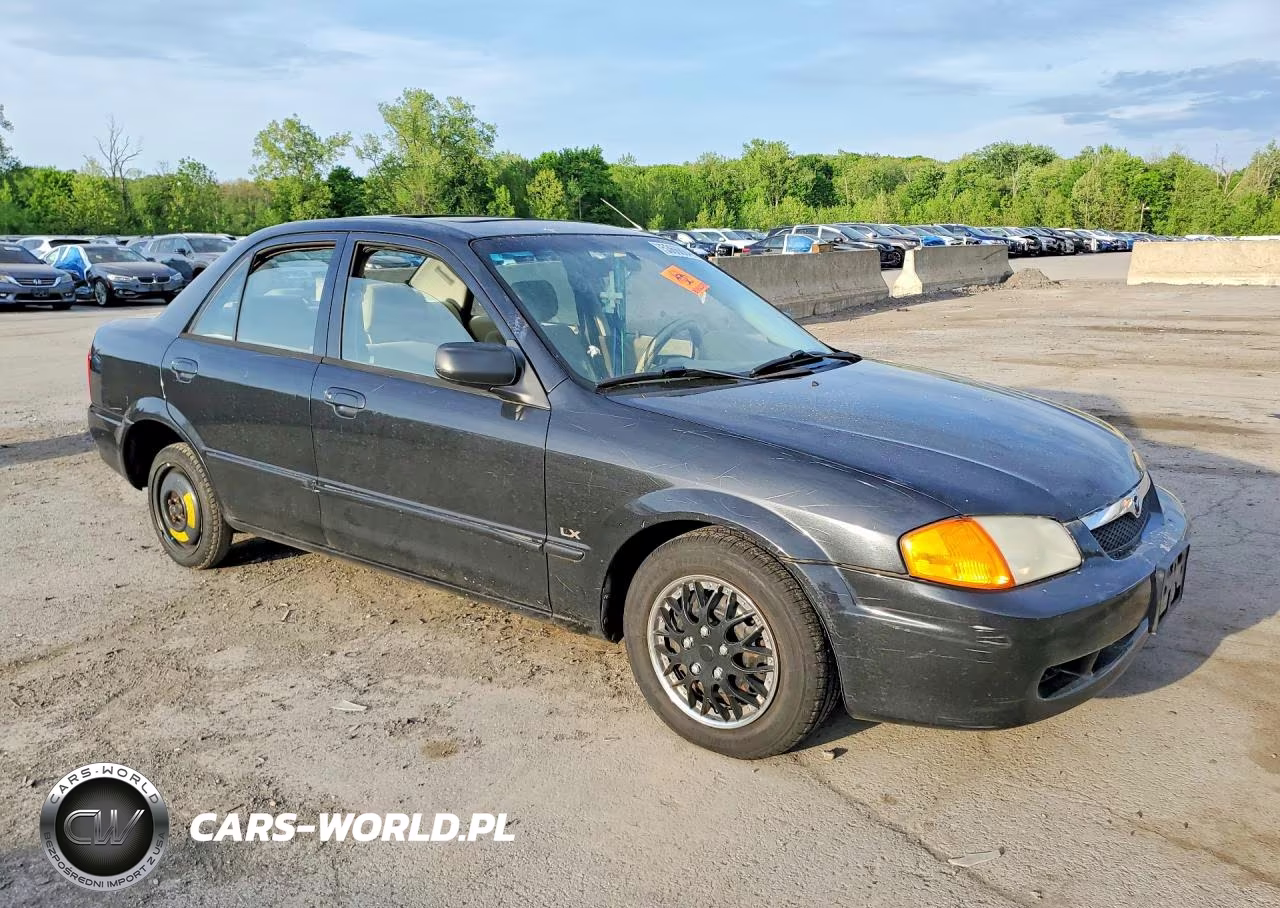 2000 Mazda Protege Dx VIN:JM1BJ2224Y0255259 - 4