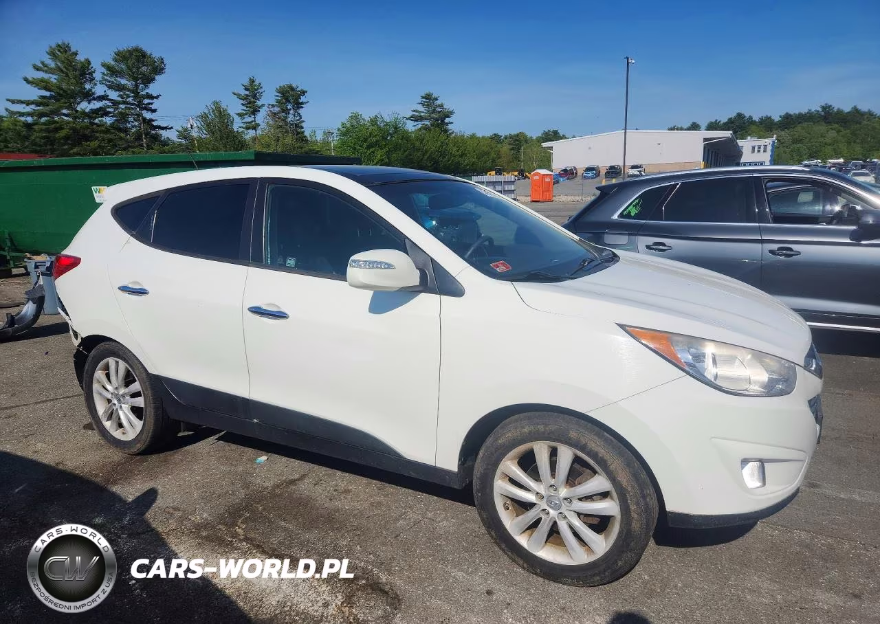 2012 Hyundai Tucson Limited VIN:KM8JUCAC1CU383104 - 4