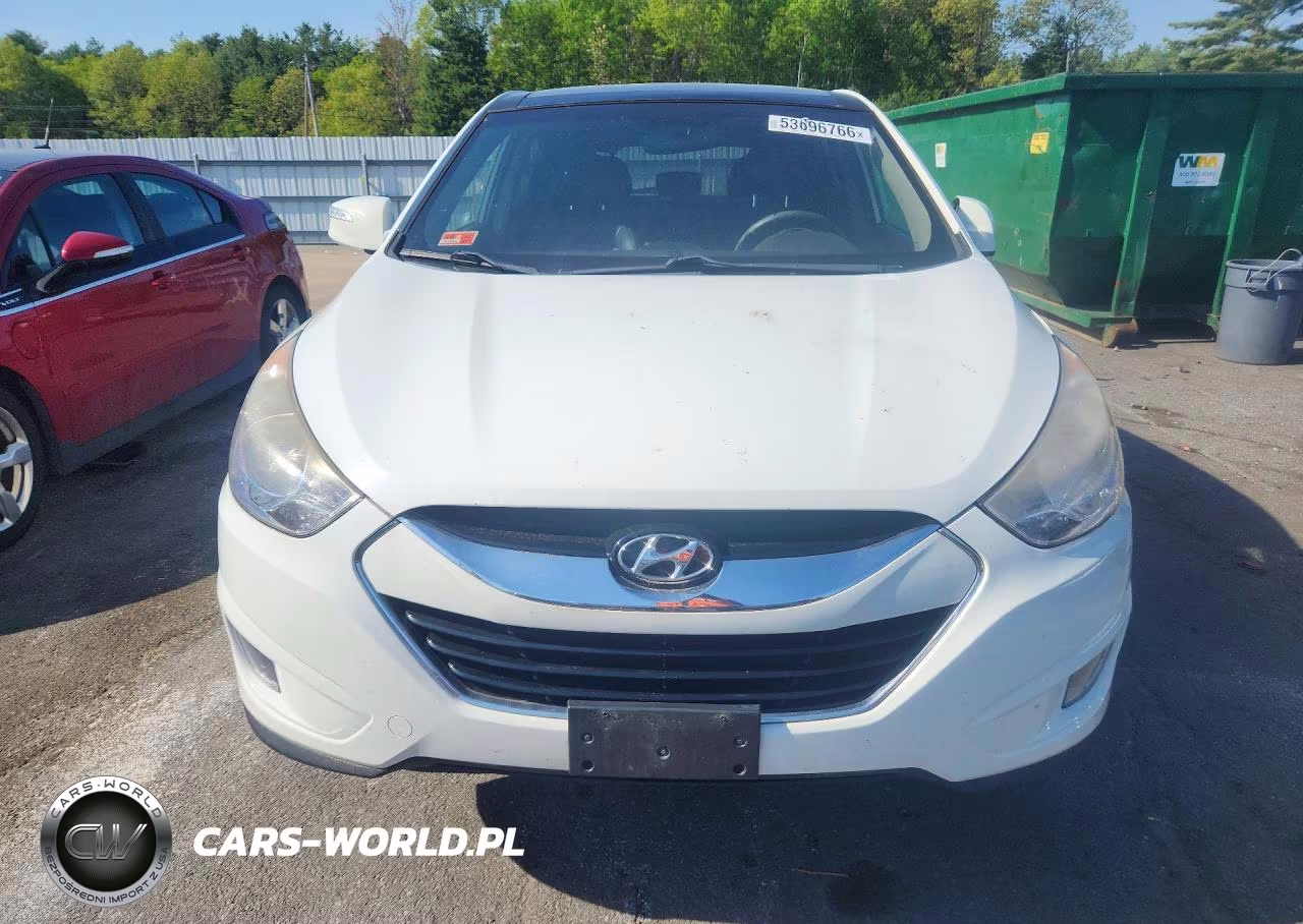 2012 Hyundai Tucson Limited VIN:KM8JUCAC1CU383104 - 5