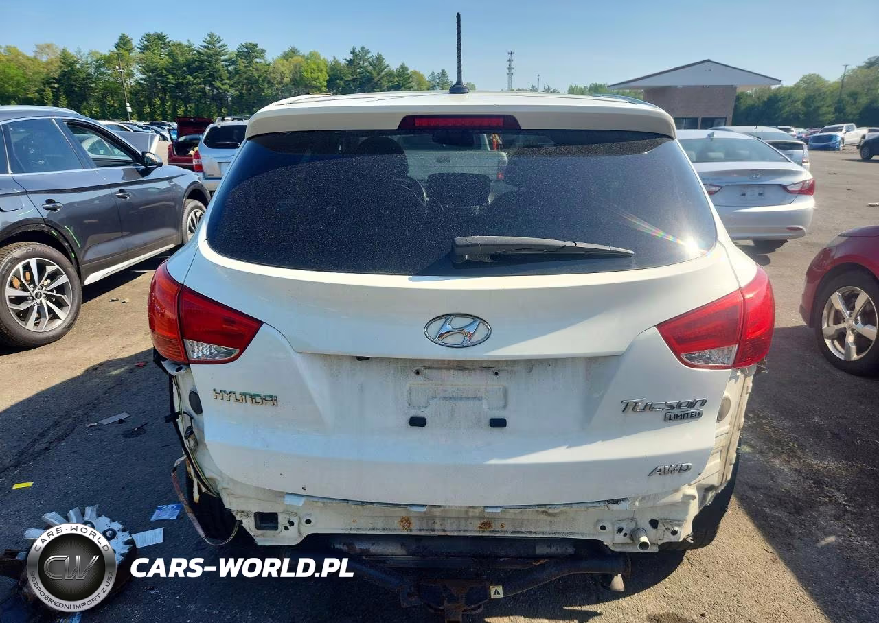 2012 Hyundai Tucson Limited VIN:KM8JUCAC1CU383104 - 6