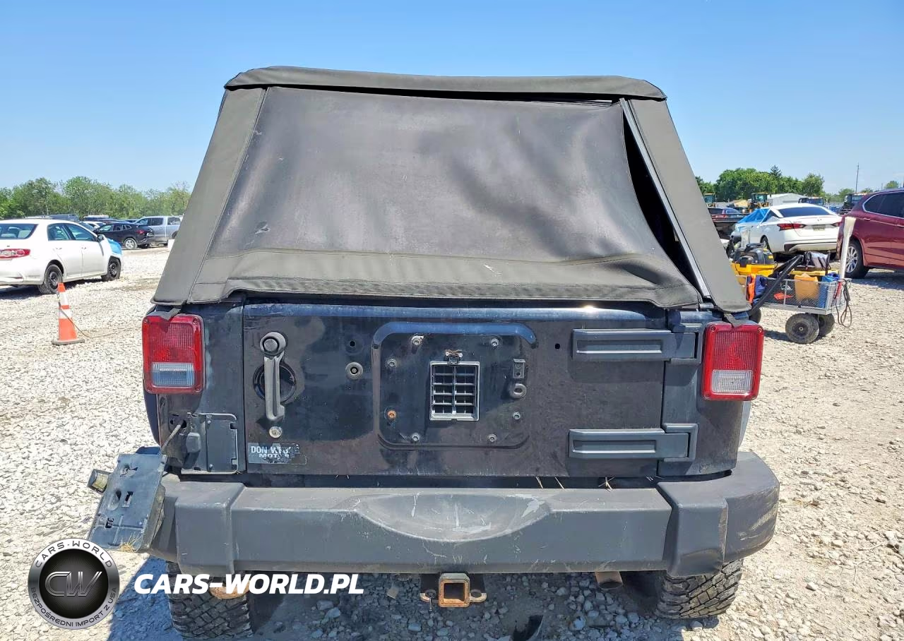 2009 Jeep Wrangler Unlimited Rubicon VIN:1J8GA69179L703383 - 6