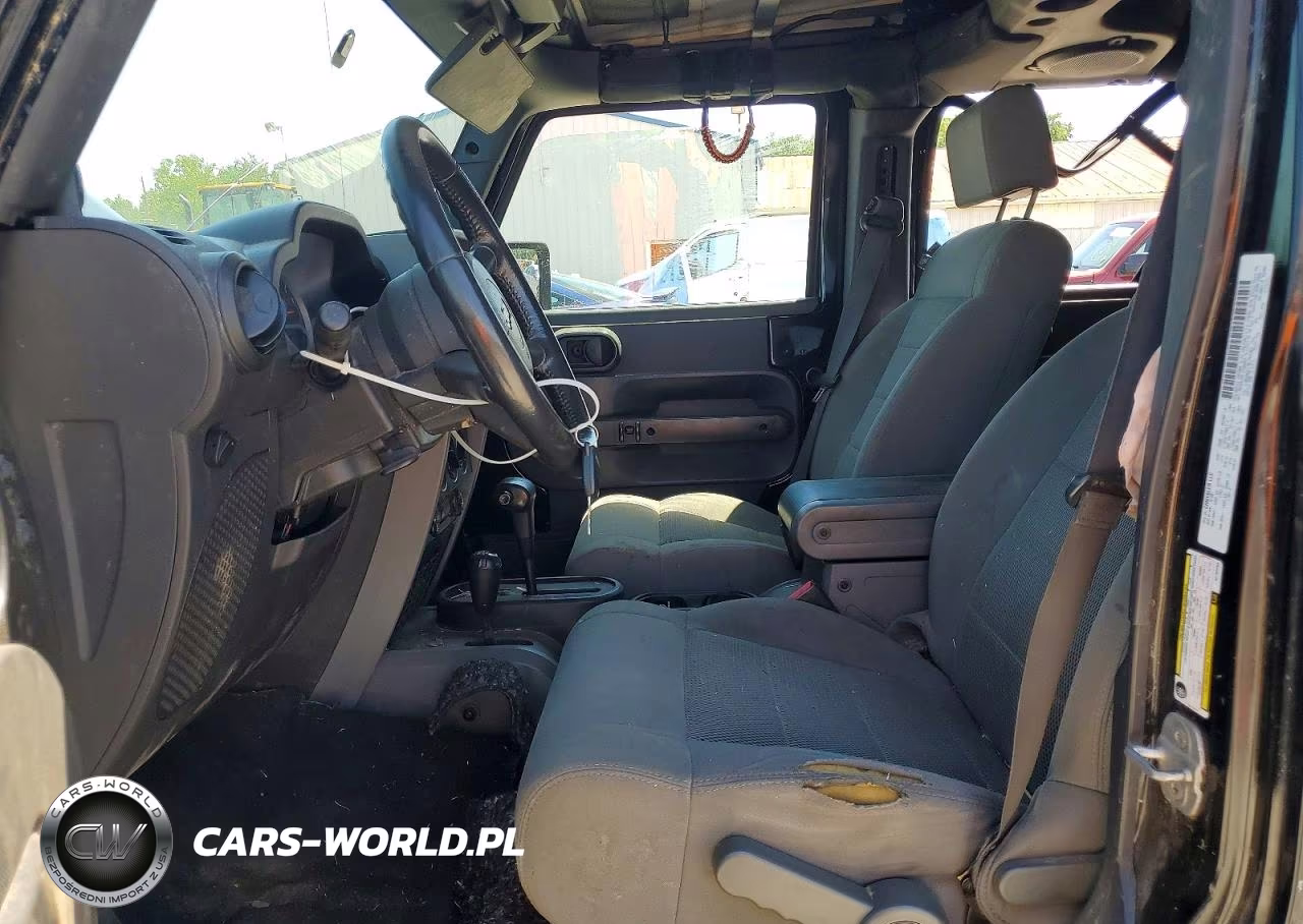 2009 Jeep Wrangler Unlimited Rubicon VIN:1J8GA69179L703383 - 7