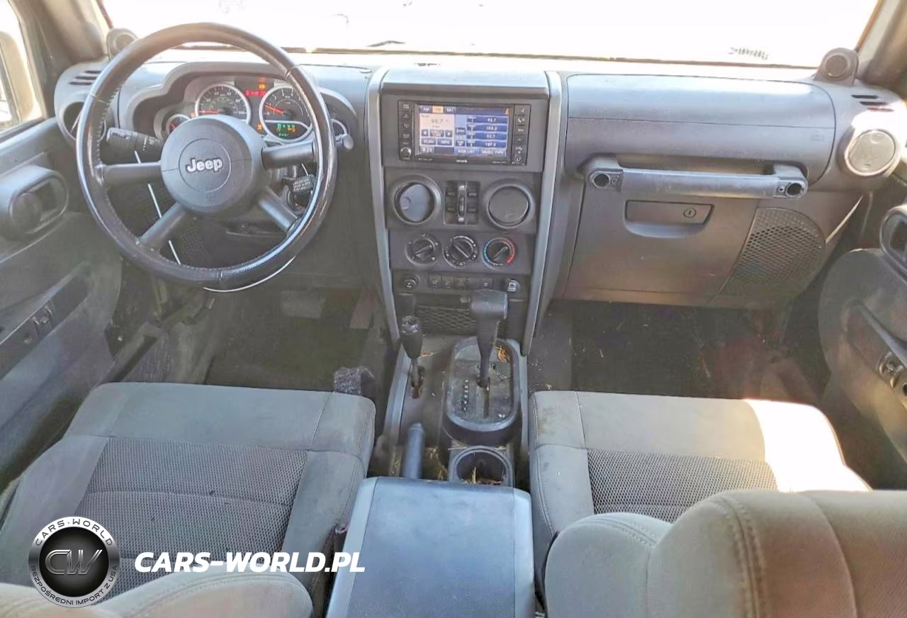 2009 Jeep Wrangler Unlimited Rubicon VIN:1J8GA69179L703383 - 8