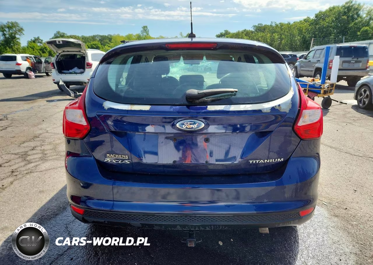 2012 Ford Focus Titanium VIN:1FAHP3N20CL102434 - 6