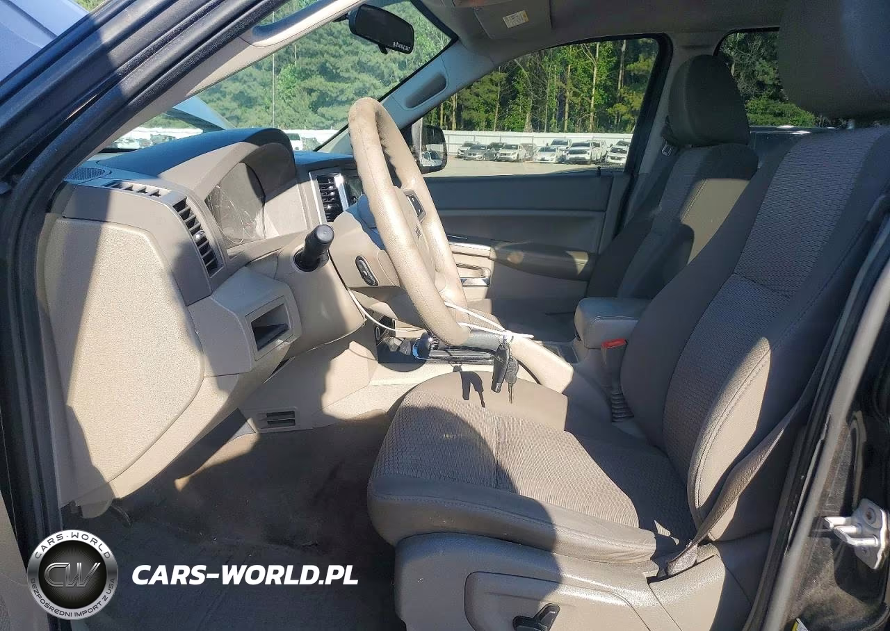 2009 Jeep Grand Cherokee Laredo VIN:1J8GS48K69C500772 - 7