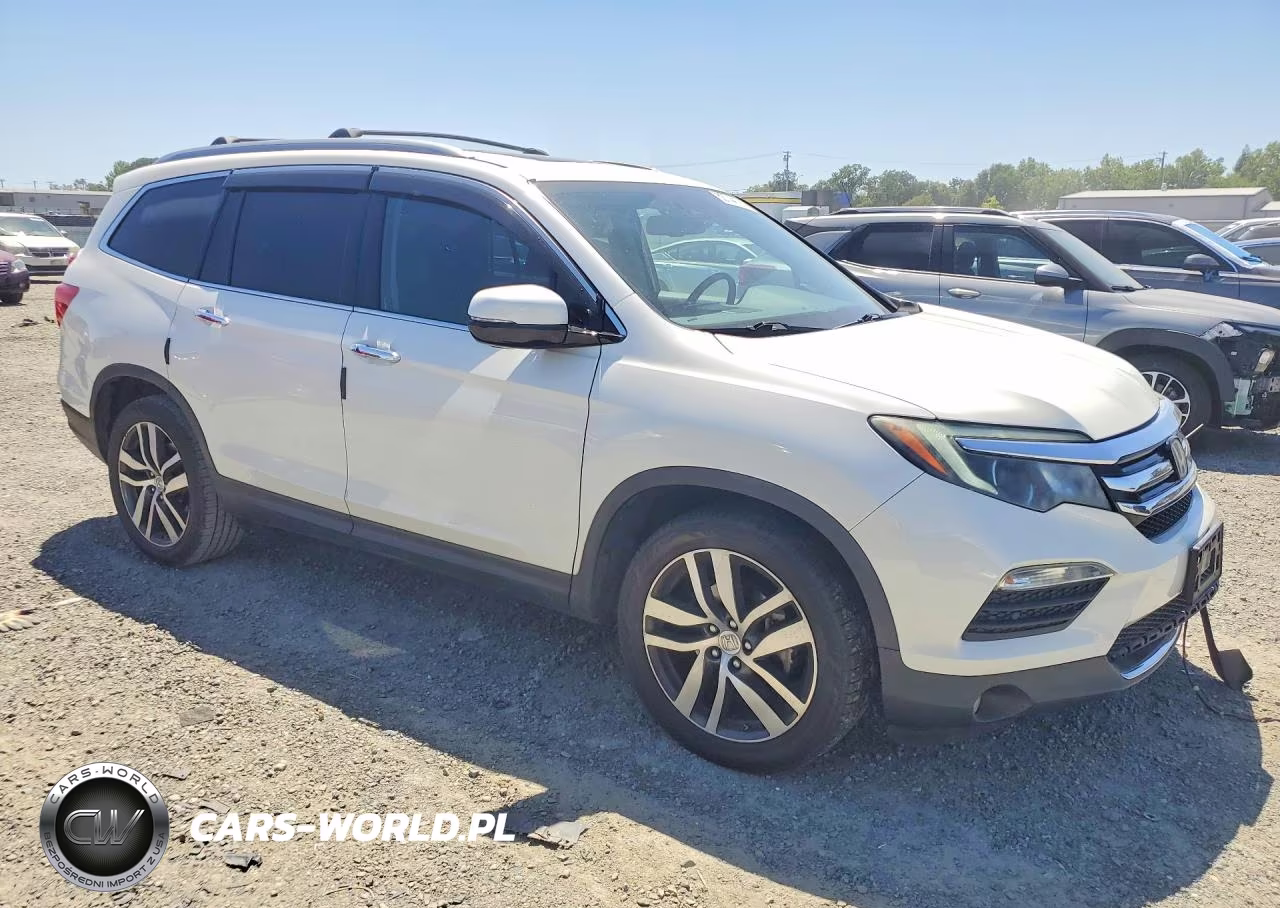 2017 Honda Pilot Elite VIN:5FNYF6H02HB031269 - 4