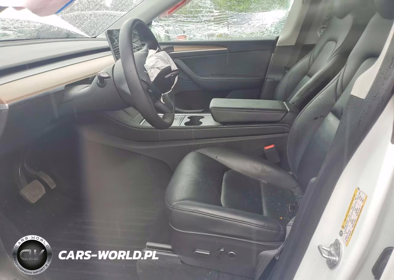 2023 Tesla Model Y VIN:7SAYGDEE7PF660304 - 7