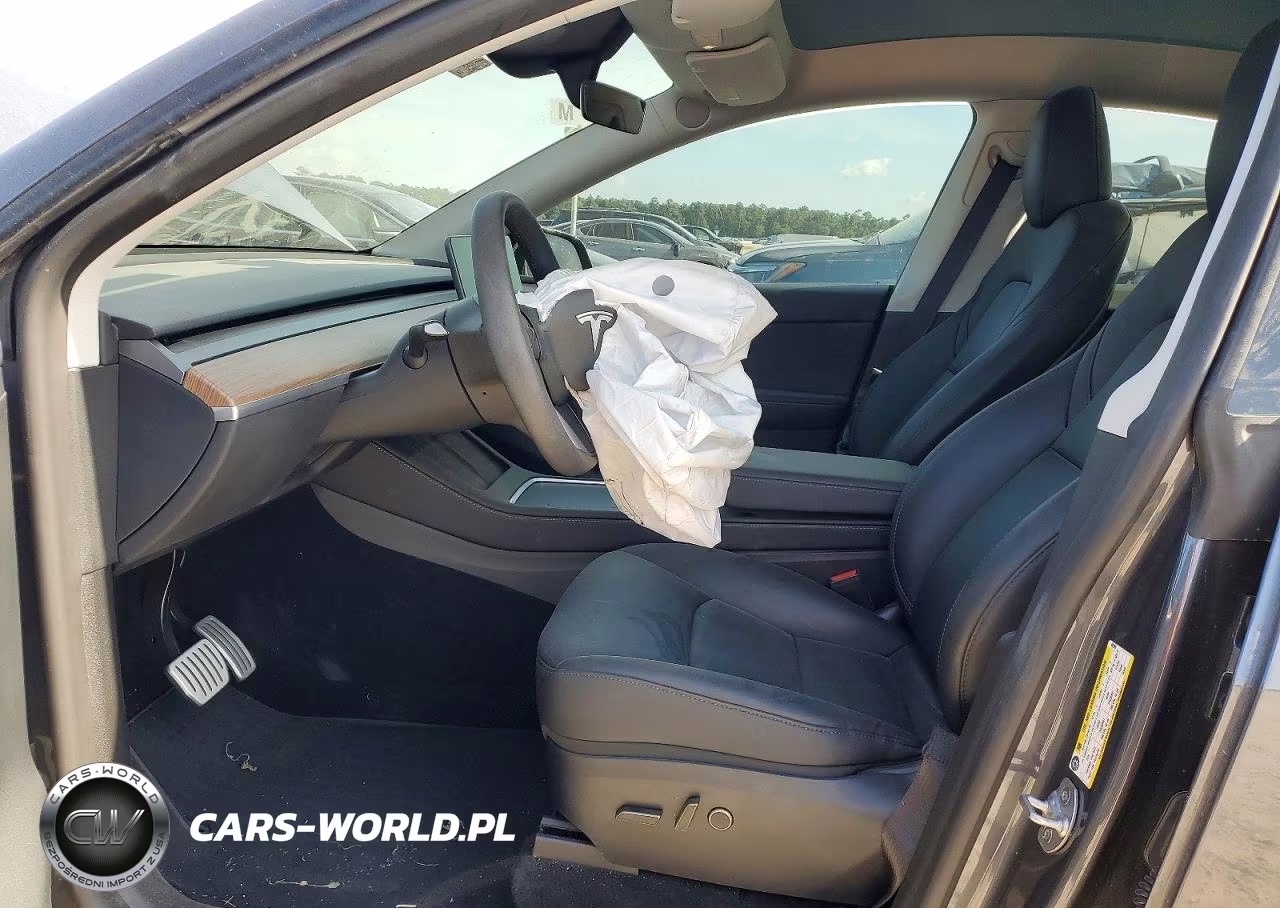 2023 Tesla Model Y VIN:7SAYGDEF4PF882369 - 7