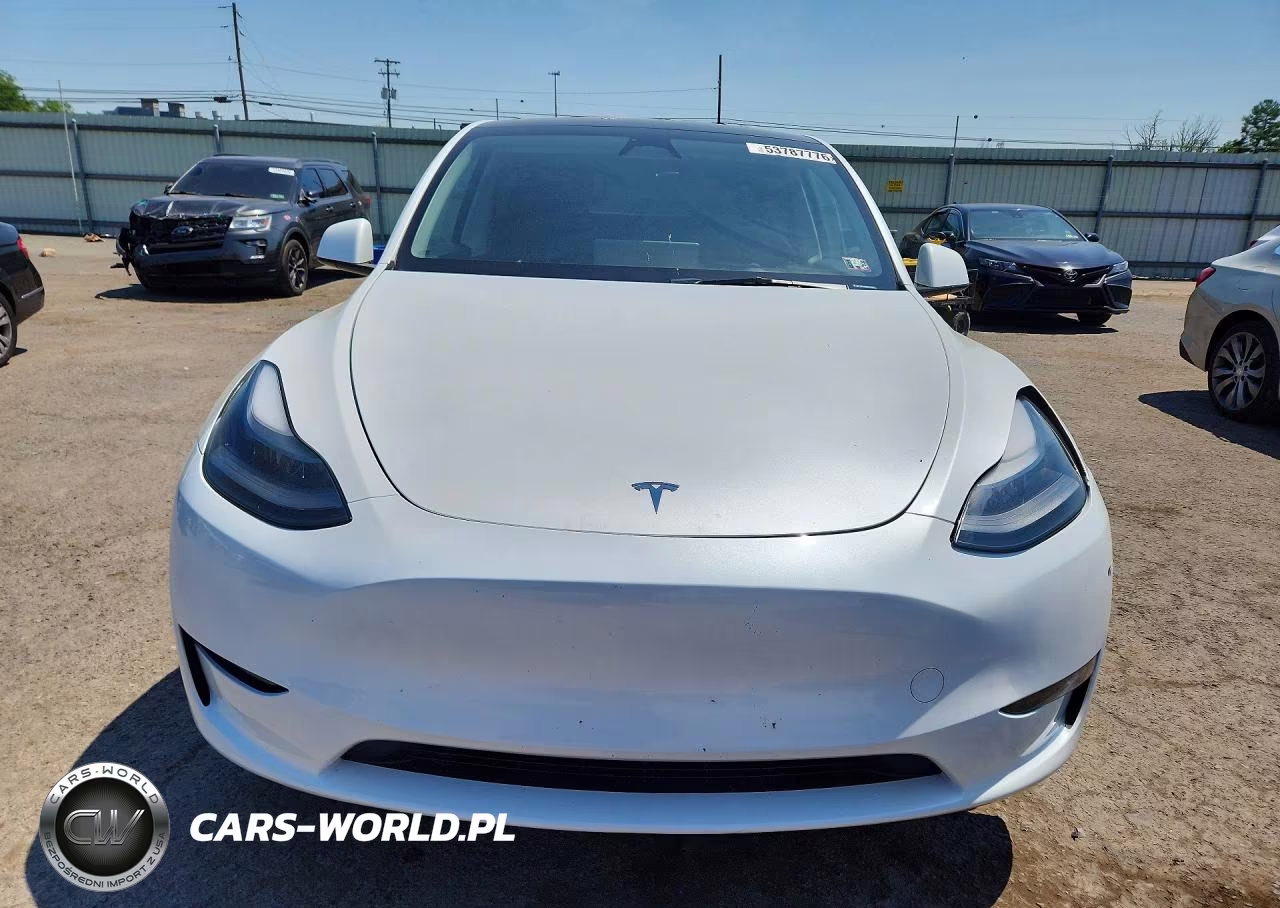 2023 Tesla Model Y VIN:7SAYGDEE1PA180885 - 5