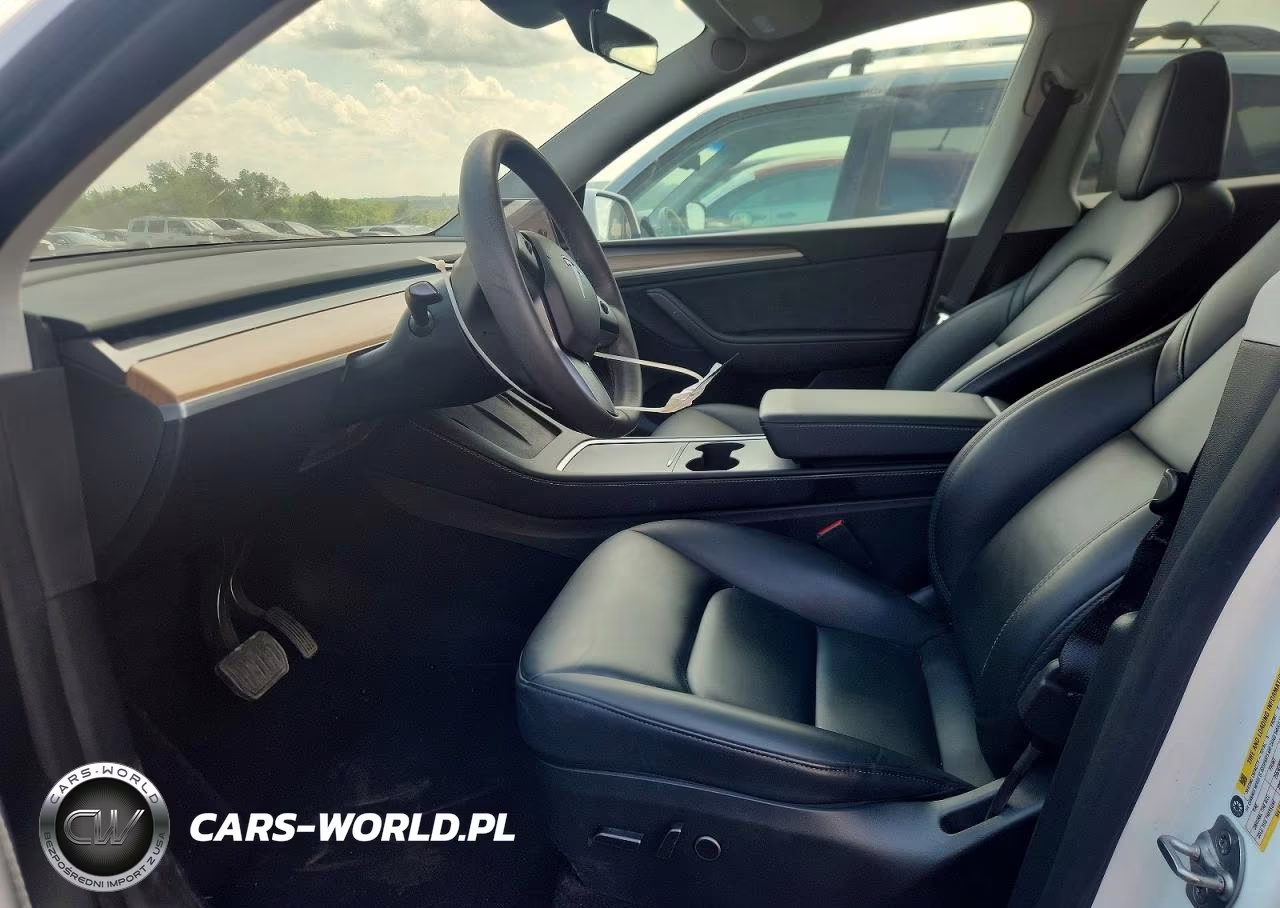 2023 Tesla Model Y VIN:7SAYGDEE1PA180885 - 7