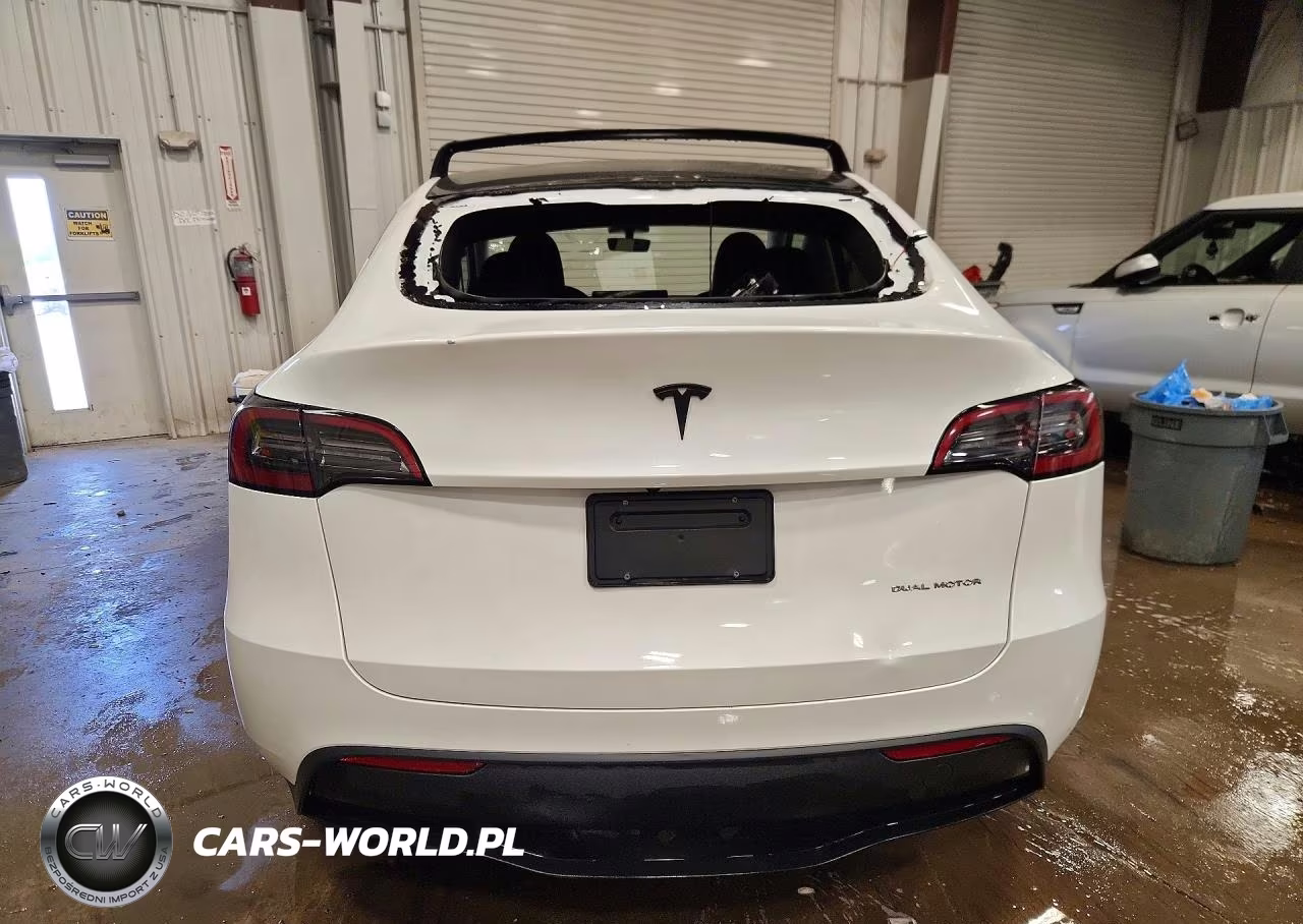 2023 Tesla Model Y VIN:7SAYGDEE9PF714007 - 6