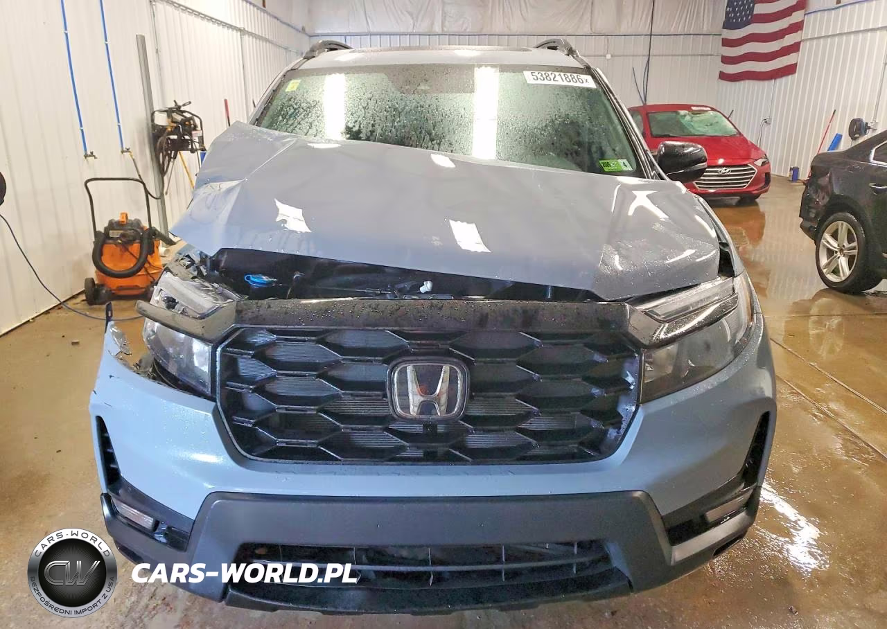 2022 Honda Passport Elite VIN:5FNYF8H00NB009598 - 5