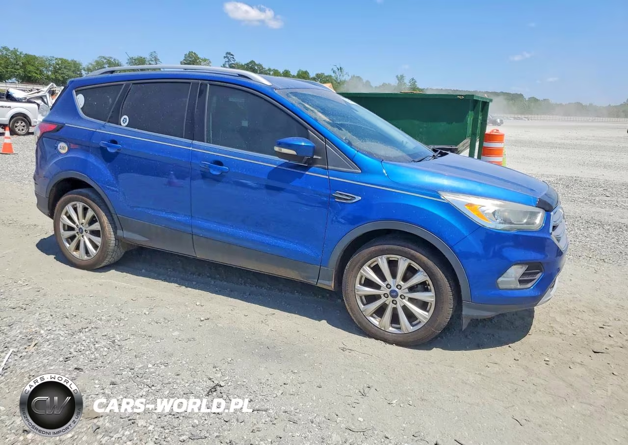 2017 Ford Escape Titanium VIN:1FMCU0JD0HUC13274 - 4