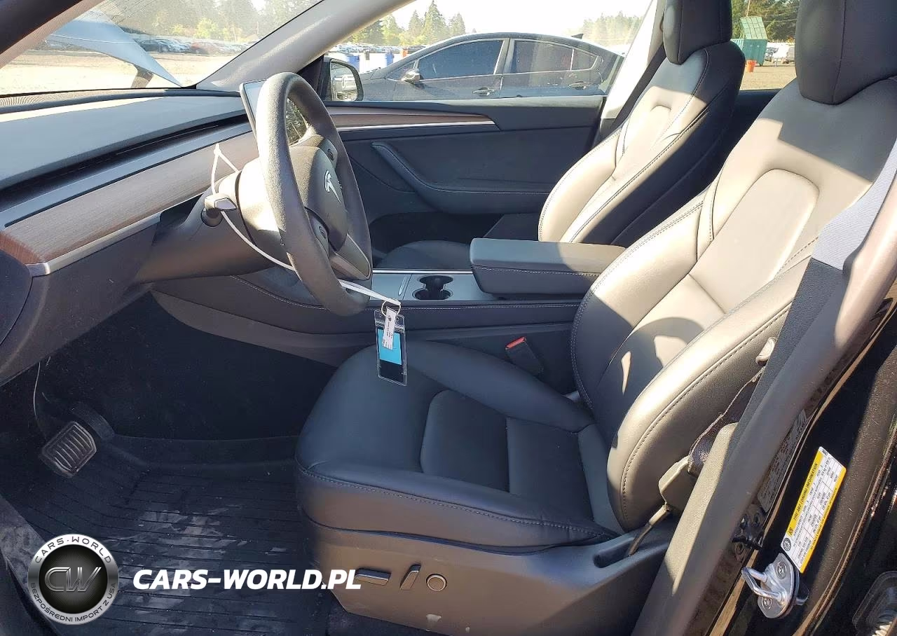 2024 Tesla Model Y VIN:7SAYGDED8RF086063 - 7