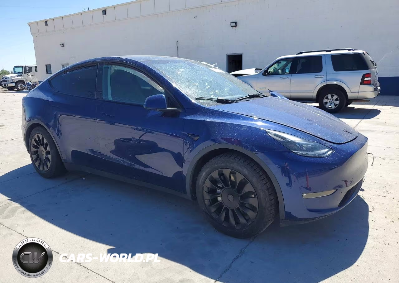 2023 Tesla Model Y VIN:7SAYGAEE5PF853243 - 4