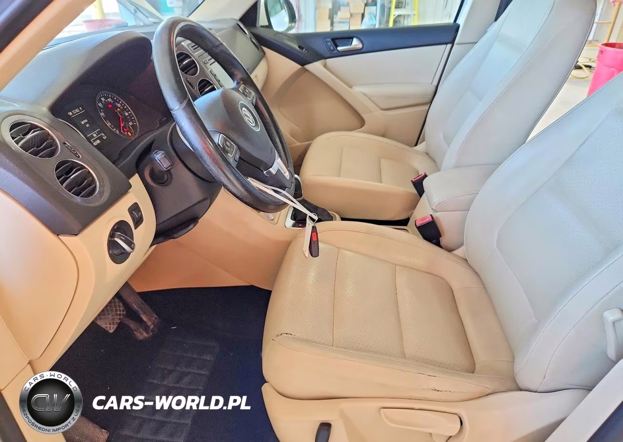 2014 Volkswagen Tiguan S VIN:WVGBV3AXXEW542858 - 7