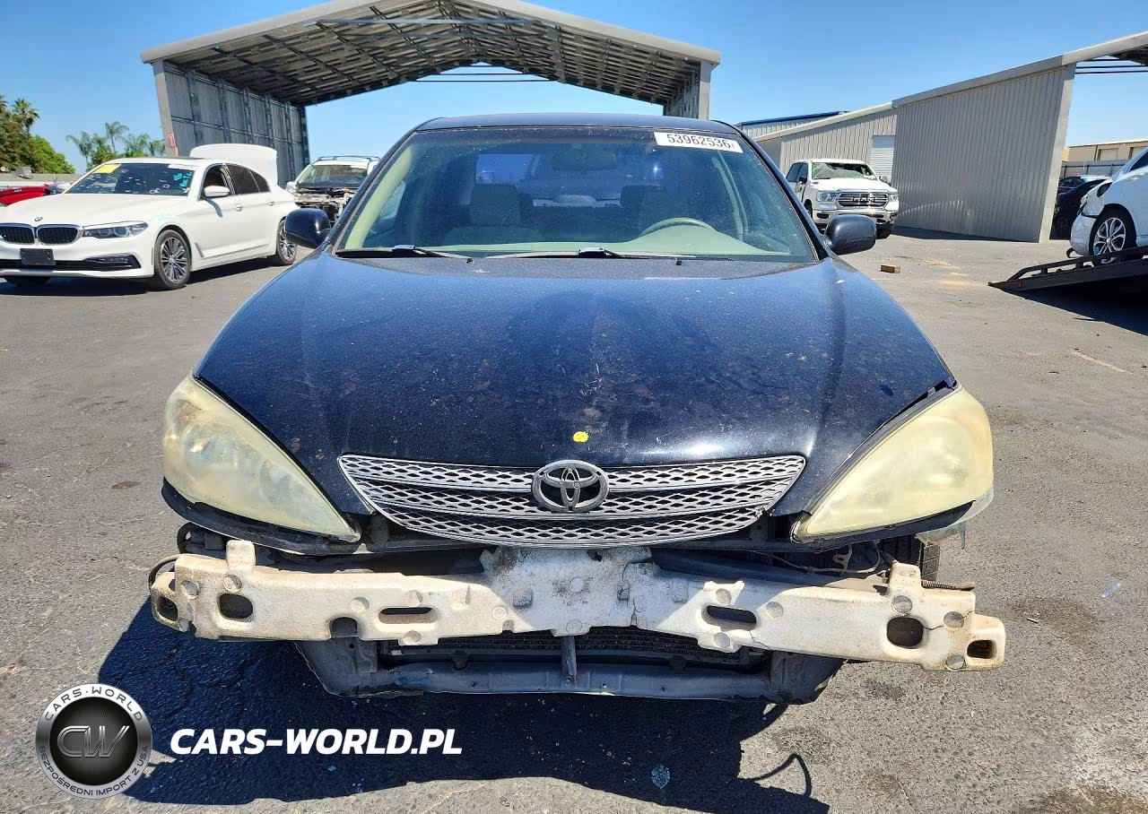 2002 Toyota Camry Le VIN:JTDBE32K320110845 - 5