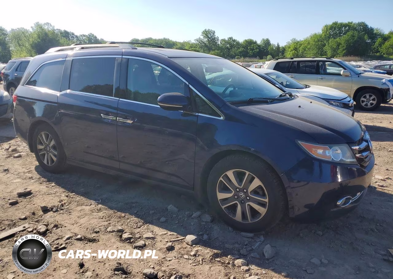 2014 Honda Odyssey Touring VIN:5FNRL5H97EB027574 - 4