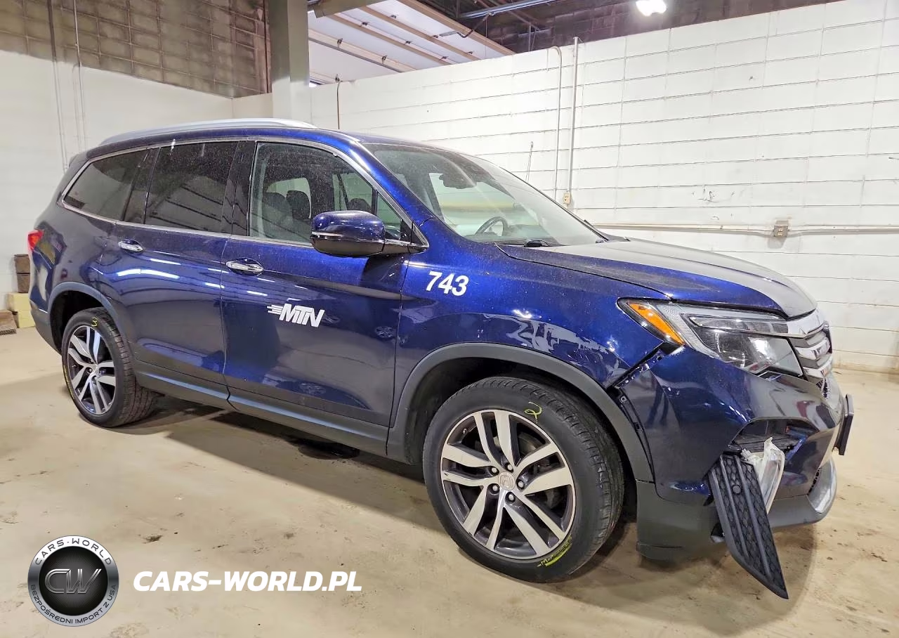 2018 Honda Pilot Elite VIN:5FNYF6H07JB023268 - 4