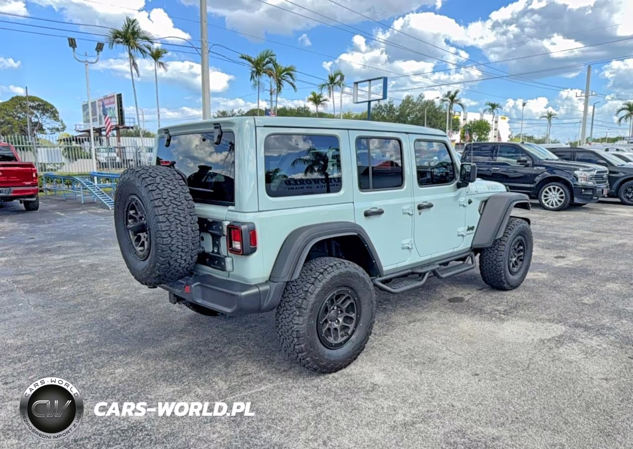 2023 Jeep Wrangler Sport VIN:1C4HJXDN7PW509945 - 4