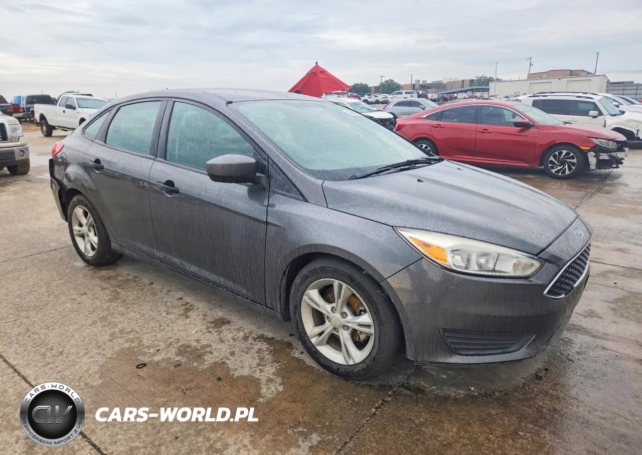 2017 Ford Focus S VIN:1FADP3E21HL230087 - 4