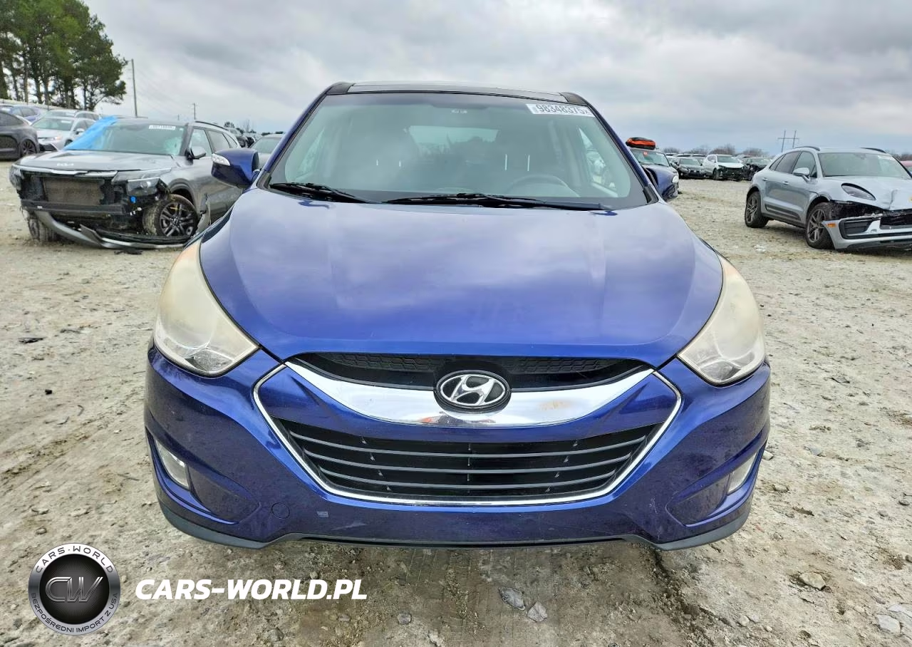 2012 Hyundai Tuscan VIN:KM8JU3AC8CU344638 - 5