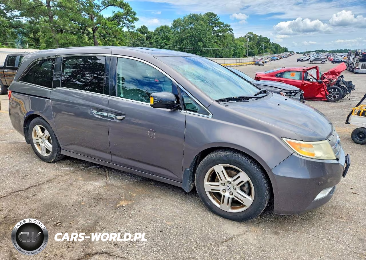 2012 Honda Odyssey Touring VIN:5FNRL5H90CB134835 - 4