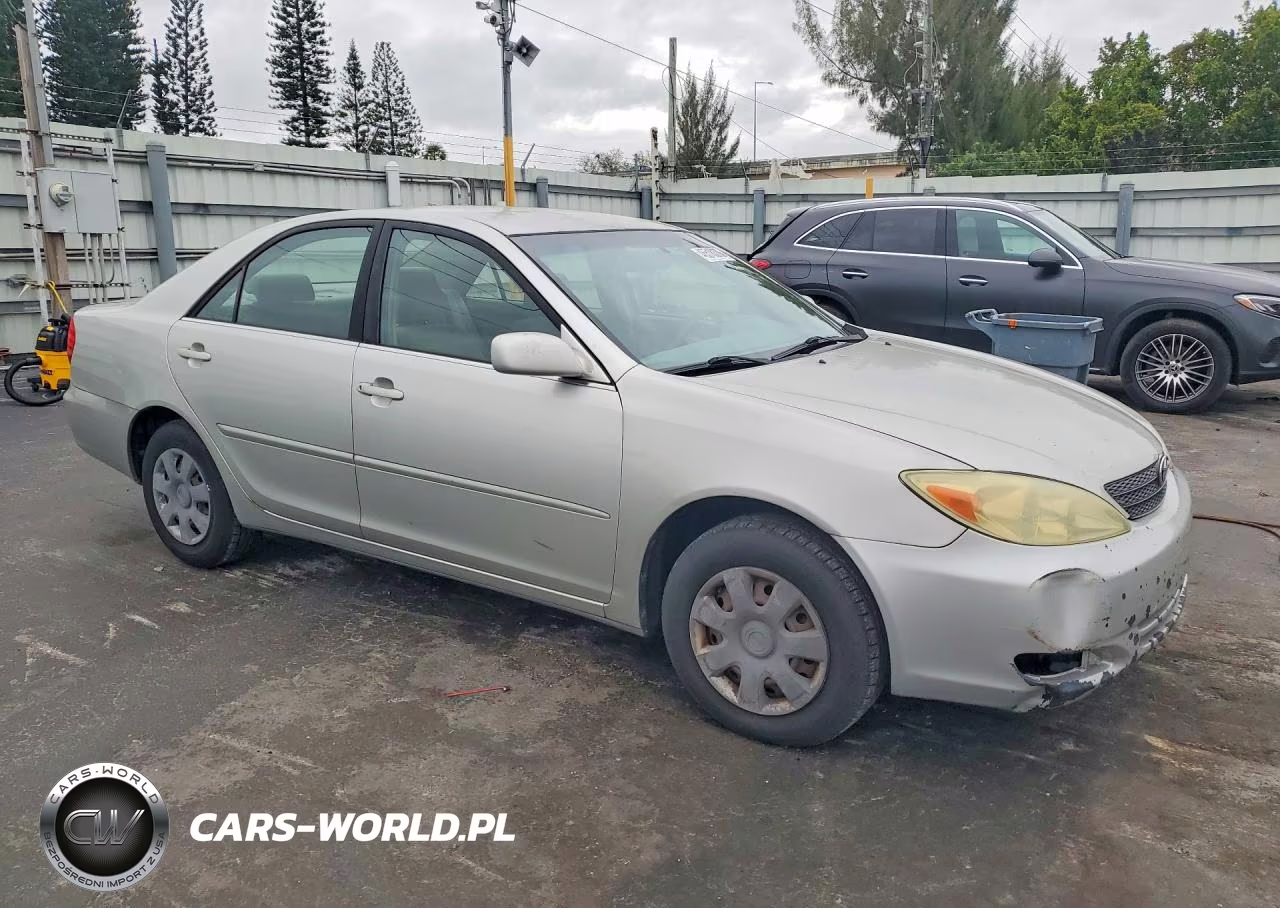 2004 Toyota Camry Le VIN:JTDBE32K640272195 - 4