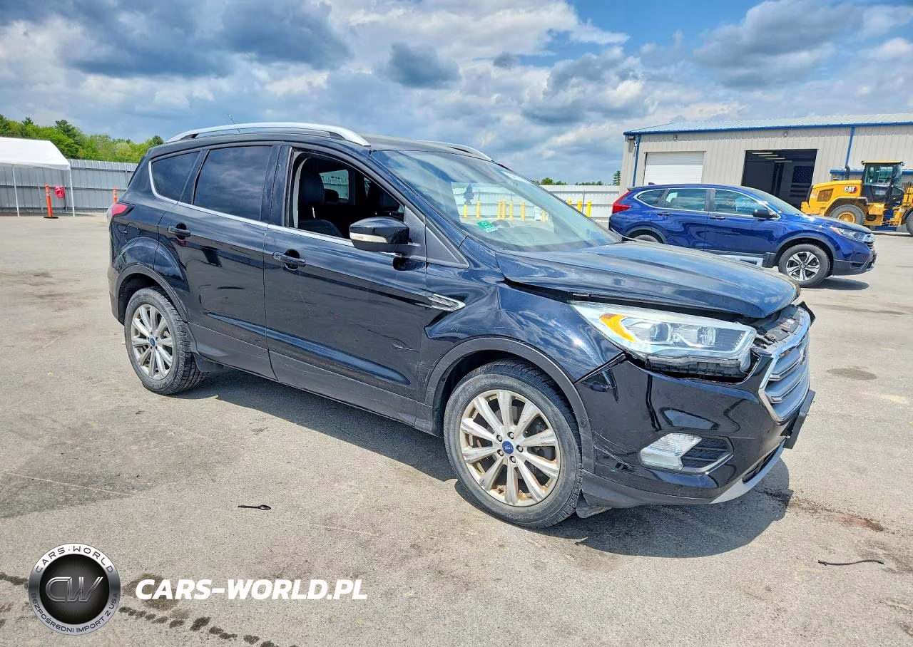 2017 Ford Escape Titanium VIN:1FMCU9JD2HUA07216 - 4
