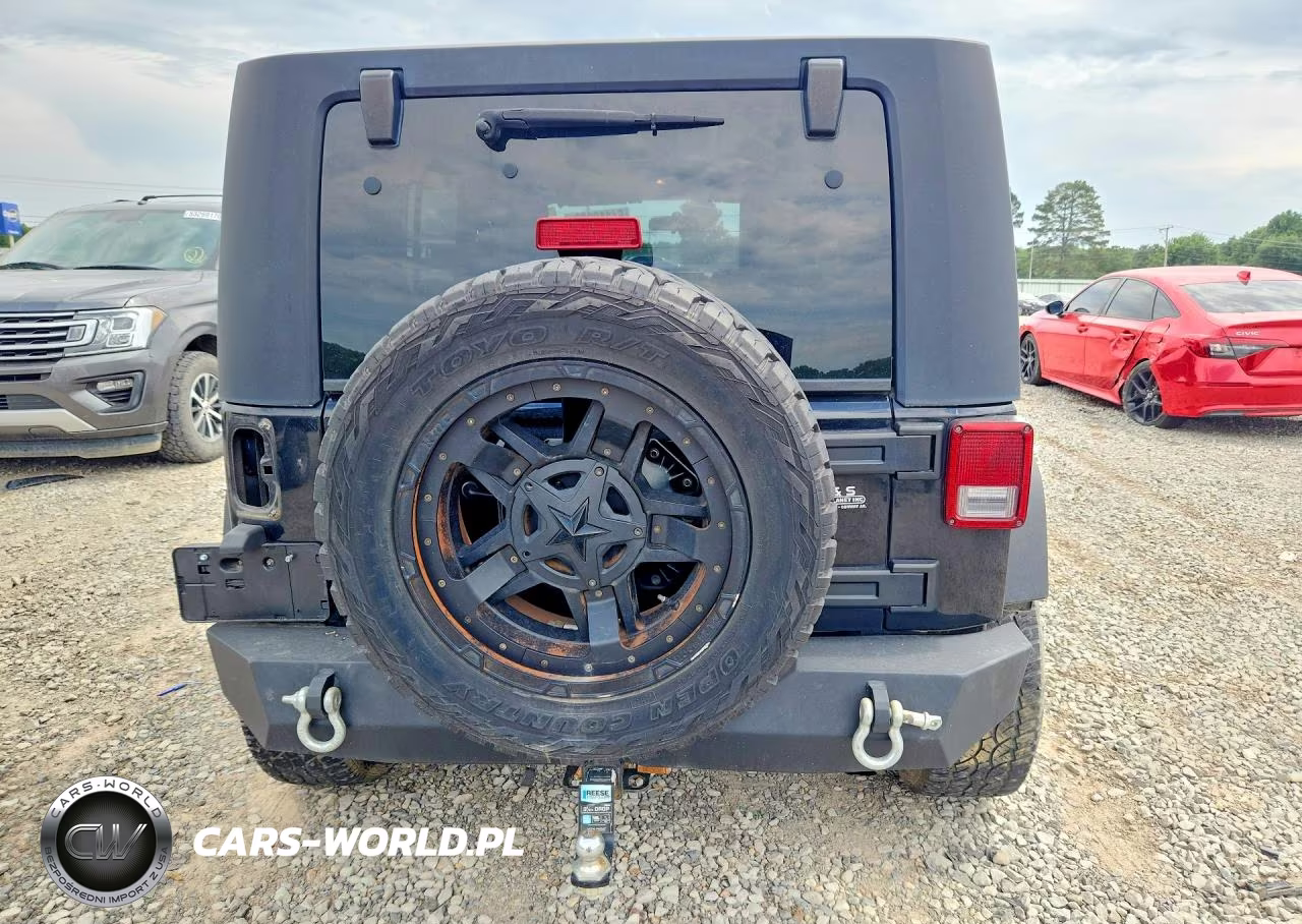 2009 Jeep Wrangler Unlimited Rubicon VIN:1J4GA691X9L765300 - 6