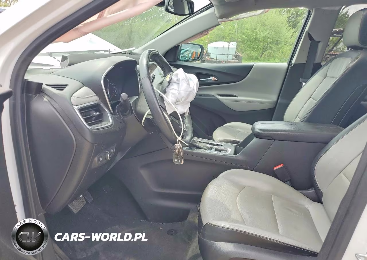 2018 Chevrolet Equinox Premier VIN:2GNAXMEV9J6125980 - 7
